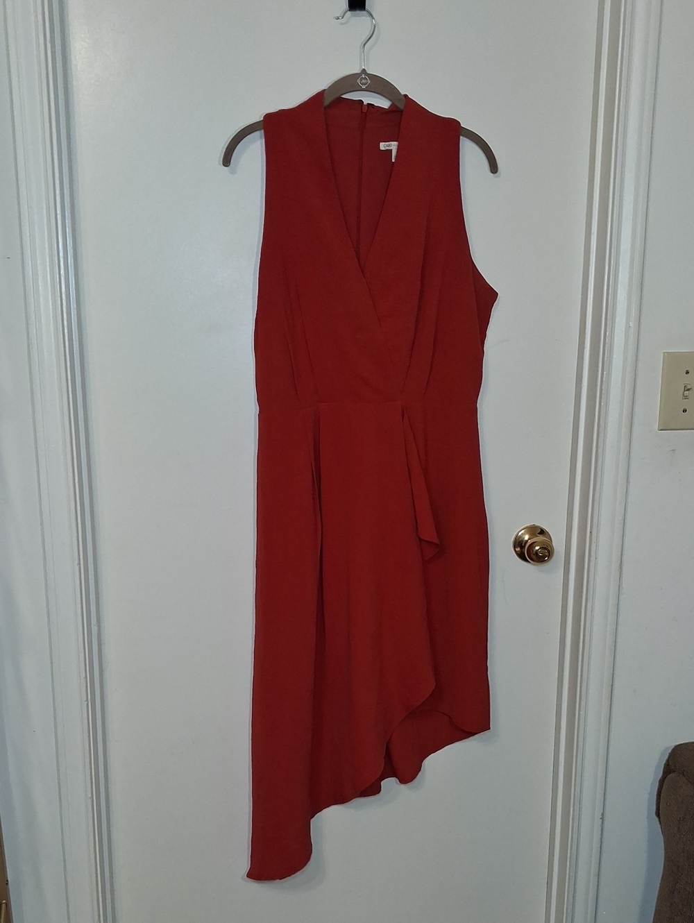 Cato Sleeveless Asymmetrical Wrap Dress in Red.